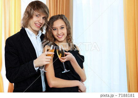 Couple in a restaurant with shampagne 7188181