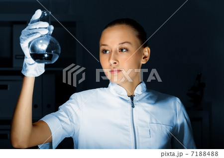 Young chemist working in laboratory Young chemist working in laboratory 7188488