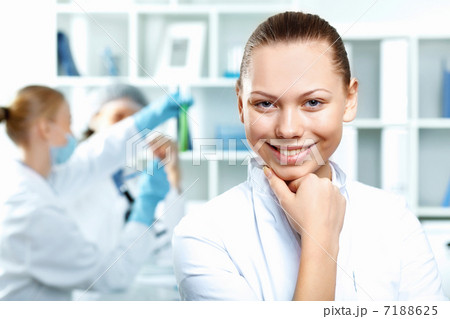 Young scientists working in laboratory Young scientists working in laboratory 7188625