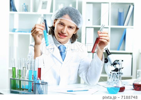 Young scientist working in laboratory Young scientist working in laboratory 7188748