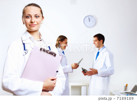 Friendly doctor in medical office Friendly doctor in medical office 7189189