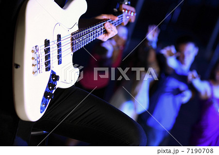 Young guitar player performing in night club Young guitar player performing in night club 7190708