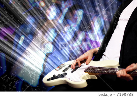 Young guitar player performing in night club 7190738