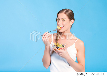 Healthy nutrition - young woman with fruits Healthy nutrition - young woman with fruits 7230334