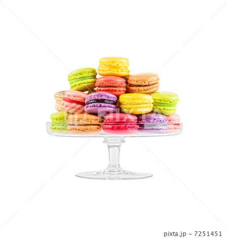 french colorful macarons in a glass cake stand 7251451