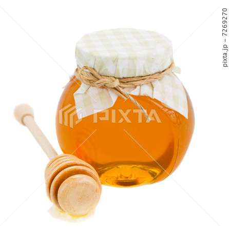 honey in glass pot and stick honey in glass pot and stick 7269270