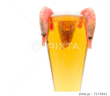 glass of light beer and shrimp on a white background glass of light beer and shrimp on a white background 7274841