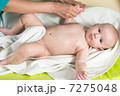 doctor massaging baby 7275048