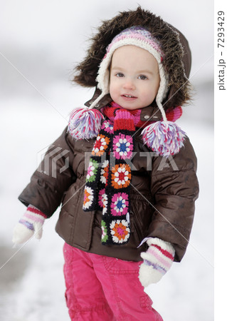 Adorable toddler girl having fun at winter 7293429