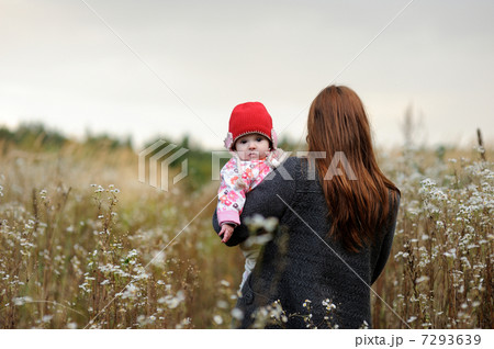 Young mother and her baby girl 7293639