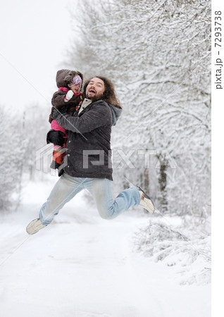 Little baby girl and her father jumping 7293738