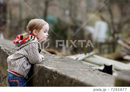 Adorable girl having fun on spring day Adorable girl having fun on spring day 7293877