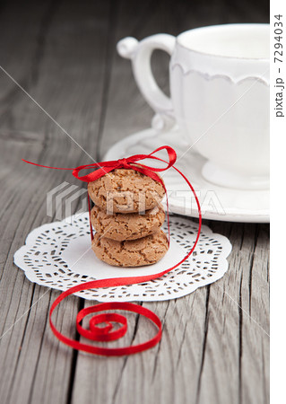 Cup of tea and cookies on wooden background Cup of tea and cookies on wooden background 7294034