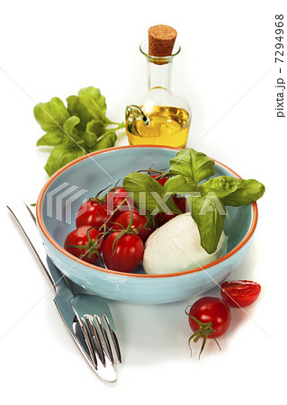 Caprese - Italian salad with tomatos and mozarella cheese Caprese - Italian salad with tomatos and mozarella cheese 7294968