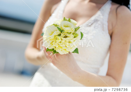 Bride holding beautiful wedding bouquet 7298736