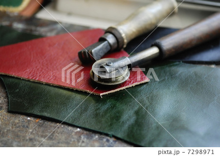 Piece of leather and some tools 7298971