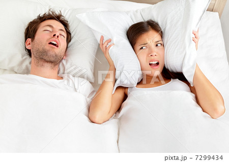 Snoring man - couple in bed 7299434