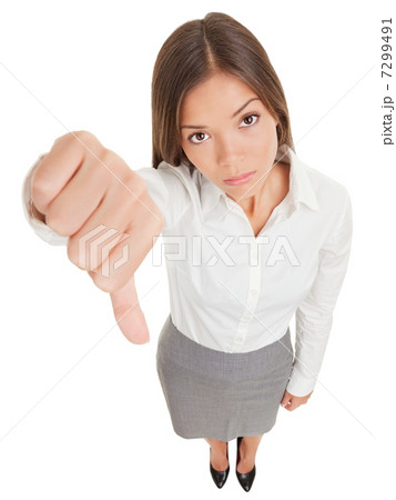 Sad business woman making a thumbs down sign 7299491