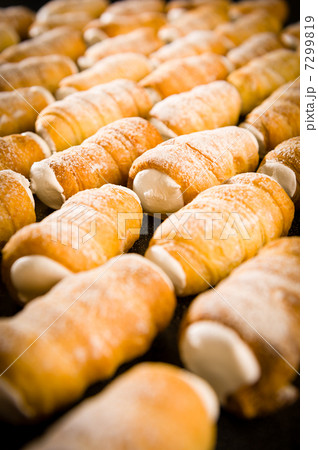Whipped cream filled cream horn pastries Whipped cream filled cream horn pastries 7299819