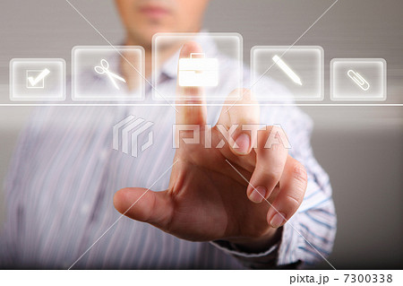 Hand touching screen with buttons on it Hand touching screen with buttons on it 7300338