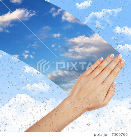 Window with blue sky and white clouds 7300766
