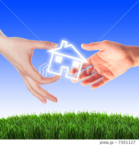 House in the hands against the blue sky House in the hands against the blue sky 7301127