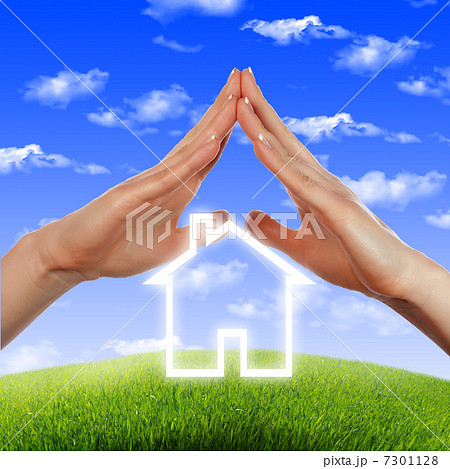 House in the hands against the blue sky House in the hands against the blue sky 7301128