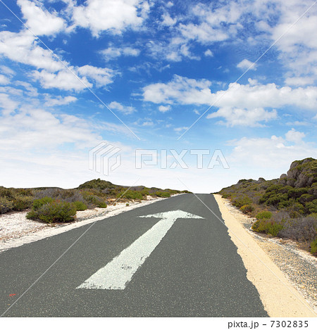 Empty countryside road with white arrow Empty countryside road with white arrow 7302835