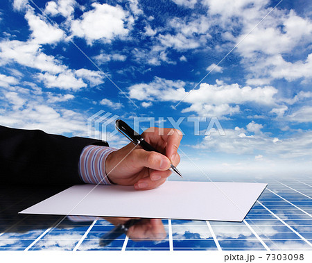 Businessman hand signing documents 7303098