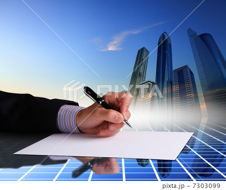 Businessman hand signing documents 7303099
