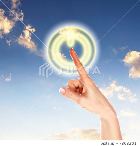 Power button against sky background 7303201