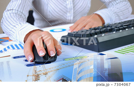 Charts, diagrams, documents on the desktop 7304067