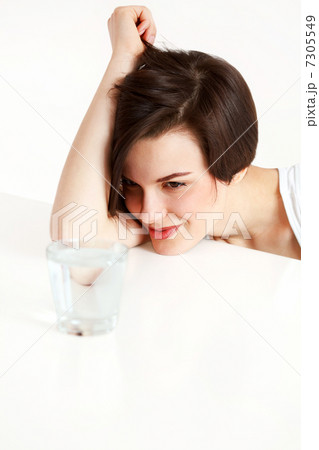 woman with glass of water woman with glass of water 7305549