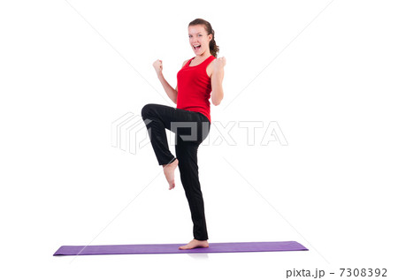 Young female doing exercises on white Young female doing exercises on white 7308392