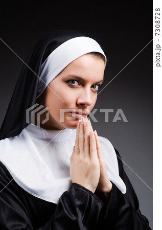 Young nun in religious concept Young nun in religious concept 7308728