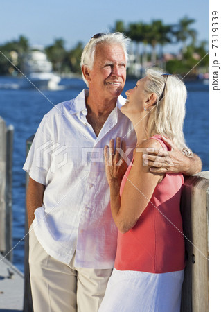 Happy Senior Couple On Vacation By Tropical Sea 7319339