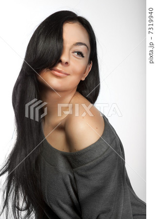 Portrait of attractive young smiling woman on white Portrait of attractive young smiling woman on white 7319940