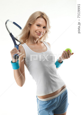 Portrait of young smiling woman with tennis racket isolated on w 7319991