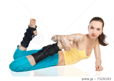 attractive woman doing gymnastics on white background attractive woman doing gymnastics on white background 7320165