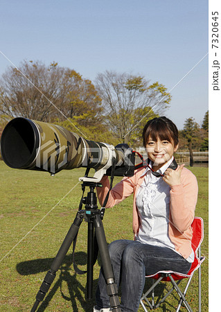 超望遠レンズと若い女性 超望遠レンズと若い女性 7320645