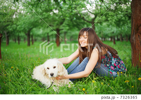 Woman play with her dog 7326365