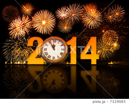 2014 year with fireworks and clock displaying 5 minutes before m 2014 year with fireworks and clock displaying 5 minutes before m 7329065