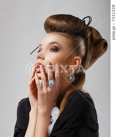 Inspiration. Gorgeous Caucasian Woman with Jewelry. Updo Hair Inspiration. Gorgeous Caucasian Woman with Jewelry. Updo Hair 7331339