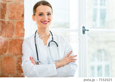 Portrait of young female doctor in clinic 7332025