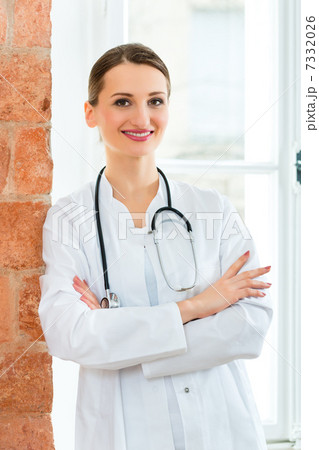 Portrait of young female doctor in clinic 7332026