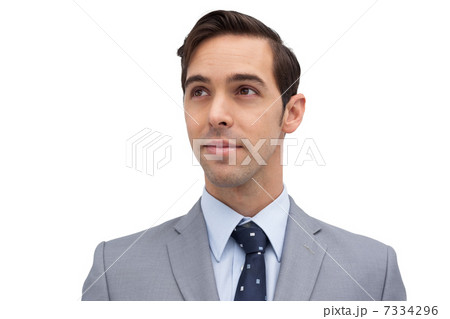 Young businessman looking away Young businessman looking away 7334296