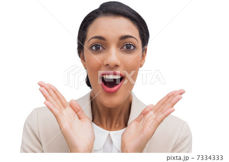 Happy businesswoman surprised by something 7334333