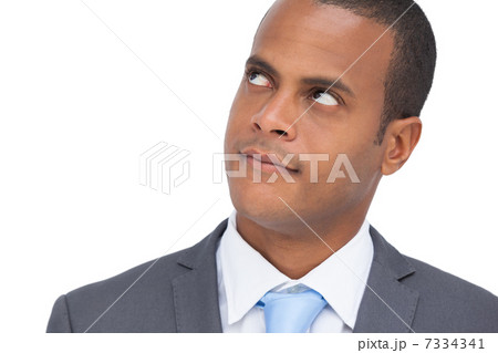 Serious businessman thinking 7334341