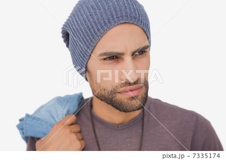 Stylish young man looking away Stylish young man looking away 7335174