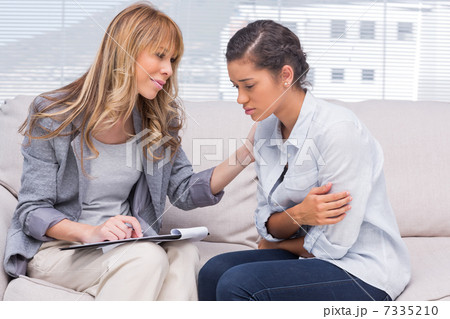 Psychotherapist helping a patient 7335210
